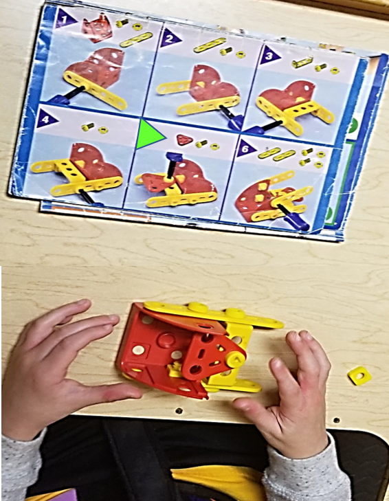 This photo shows a page of step-by-step images of how to build a car along with the child’s attempt to build the project.  The attempt shows errors of spatial orientation.