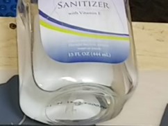 The photo above shows a small bottle of hand sanitizer.